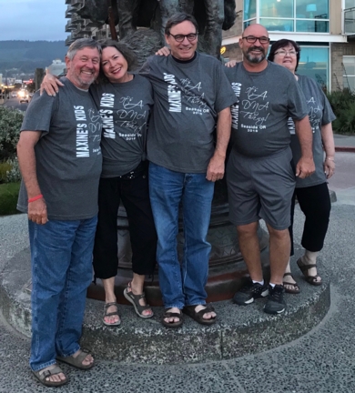 Dennis LaVoy, Rita Glueckert, Joe Glueckert, Ray Glueckert, Sandy Pimperton (a cousin who was instrumental in connecting the family dots). Shirts read: Maxine’s Kids - It’s a DNA Thing! Seaside, Or 2018